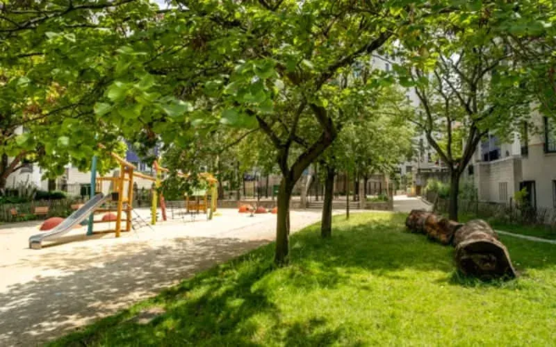 Benches and trees at Square Paul Paray on a fine day