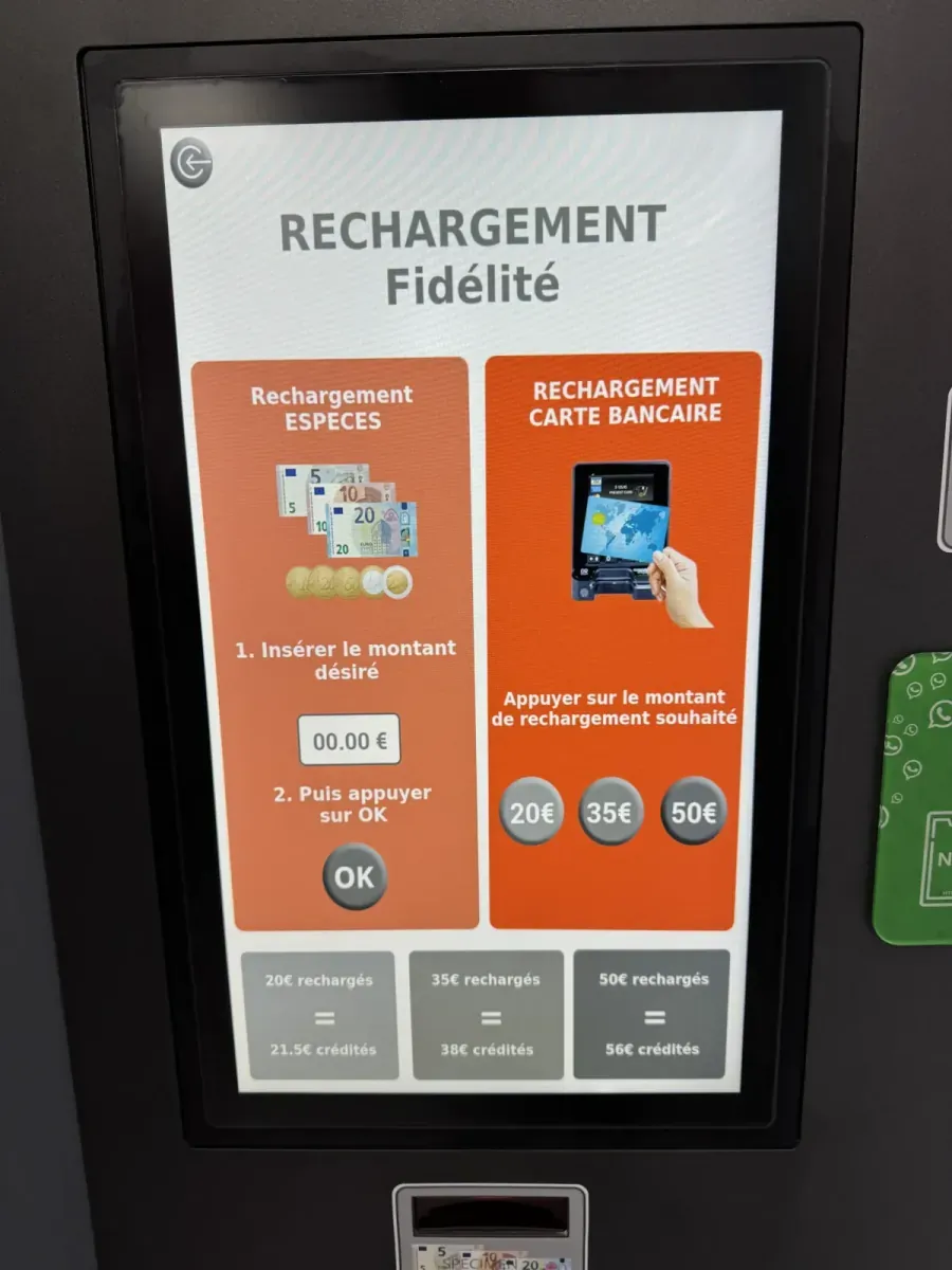 The payment terminal screen showing the Simply Pay top-up tiers: €20 loaded gives €21.50